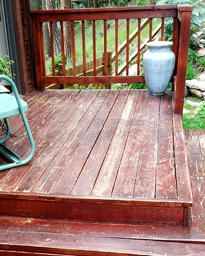 Faded weathered deck before staining in Columbus GA